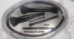 makeup brushes on tray with text who to wash your makeup brushes
