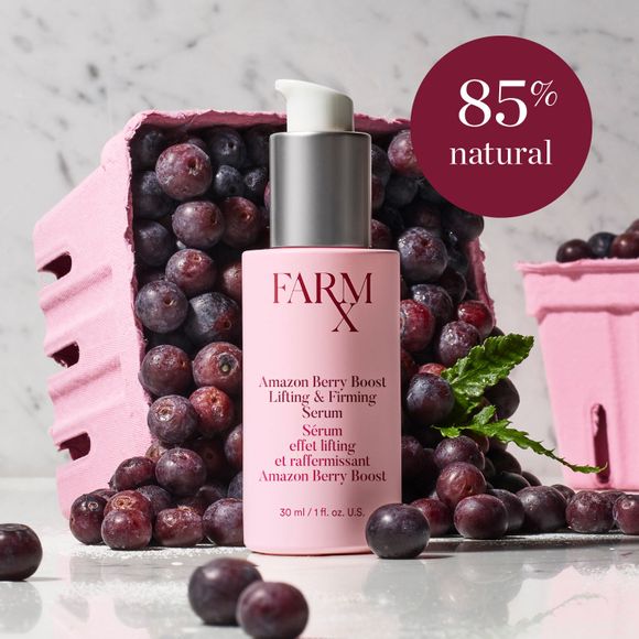 pump bottle of Farm Rx Amazon Berry Boost Lifting & Firming Serum in front of a carton of acai berries