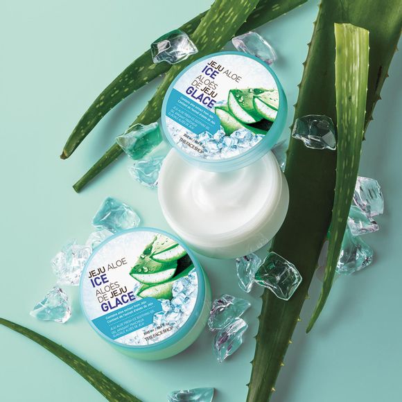one closed jar and one open jar of jeju aloe fresh ice soothing gel with ice and aloe leaves